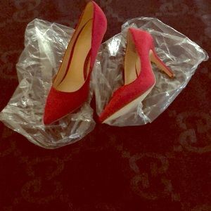 Red suede pumps